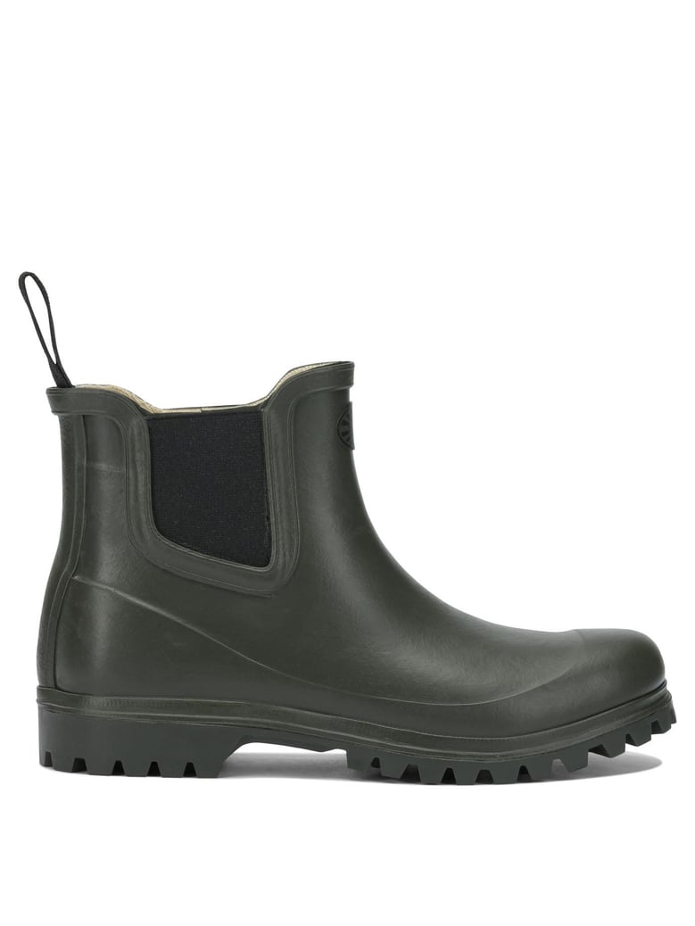 green rubber ankle boots by Selfnex