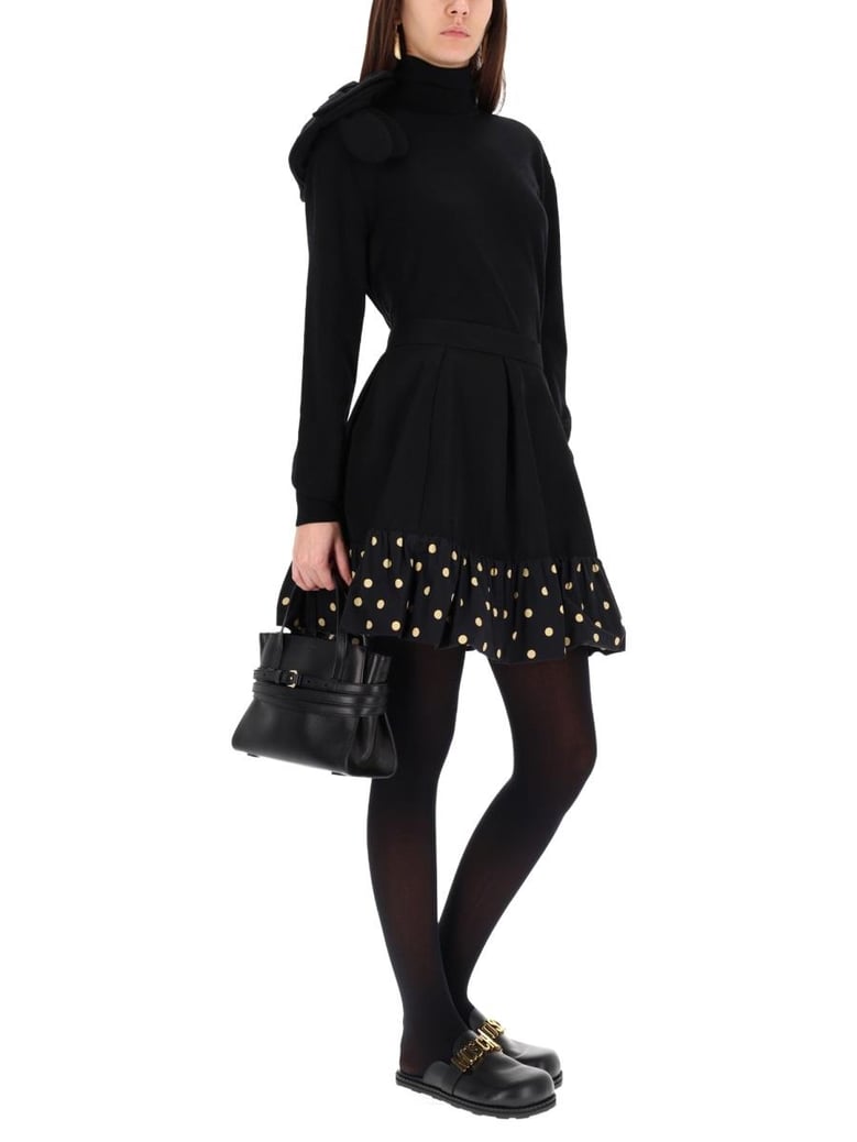black turtleneck sweater with flower detail by Selfnex
