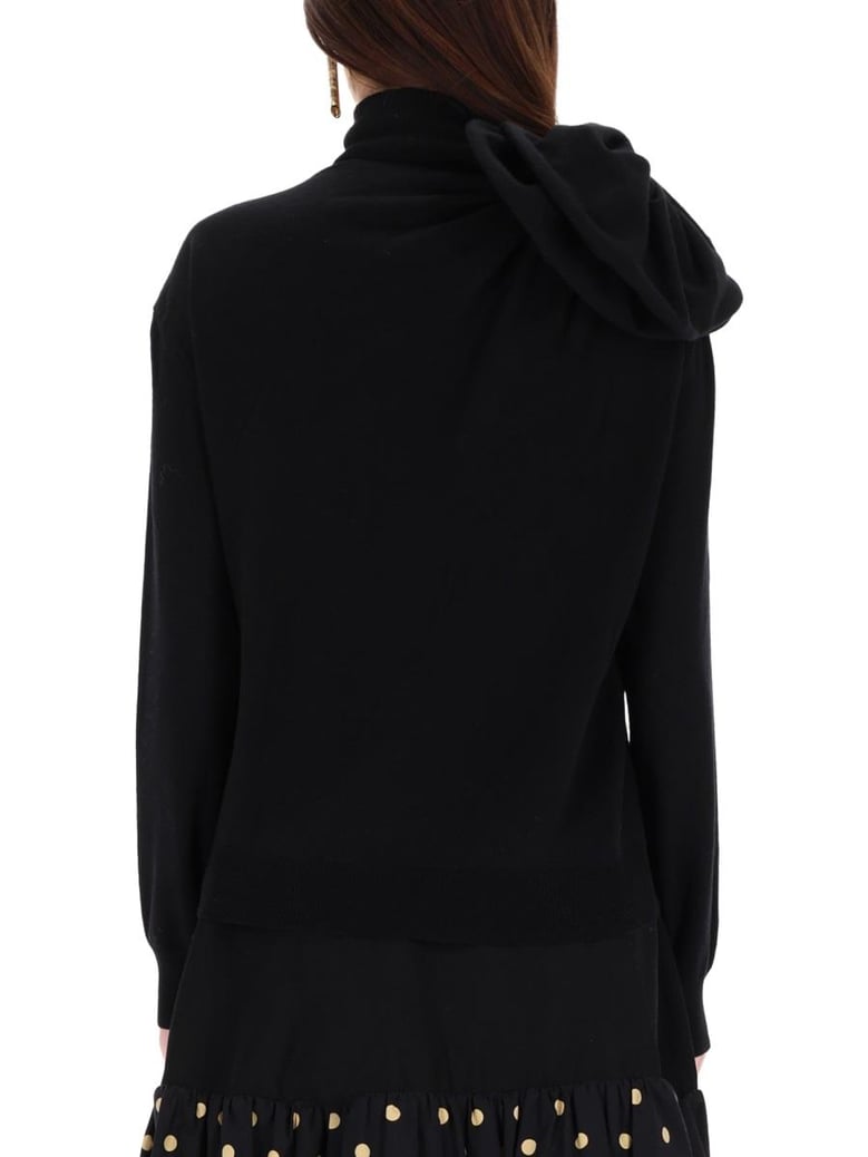 black turtleneck sweater with flower detail by Selfnex