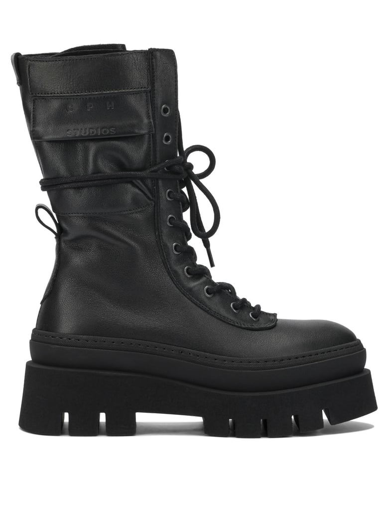 black leather ankle boots by Selfnex