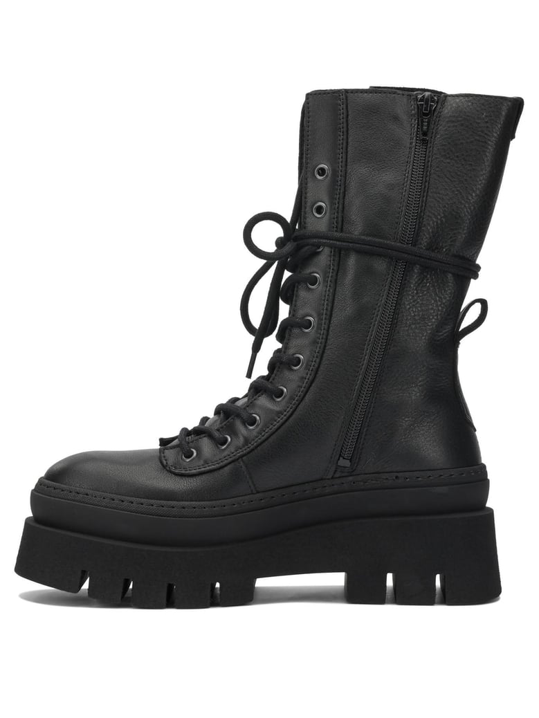 black leather ankle boots by Selfnex
