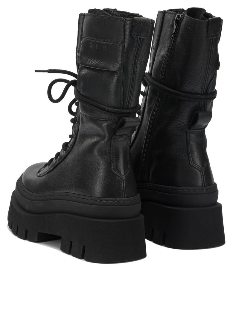 black leather ankle boots by Selfnex