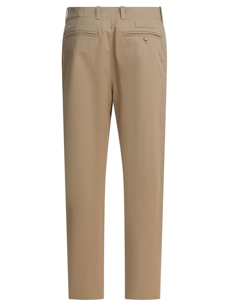 beige cotton trousers by Selfnex