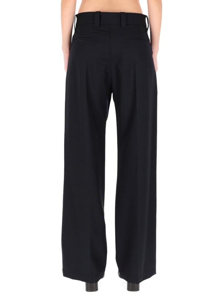 blue wool-blend trousers by Selfnex