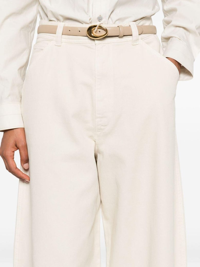 beige cotton trousers by Selfnex