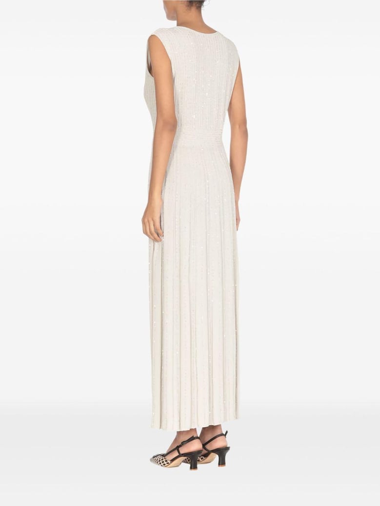 beige pleated maxi dress by Selfnex