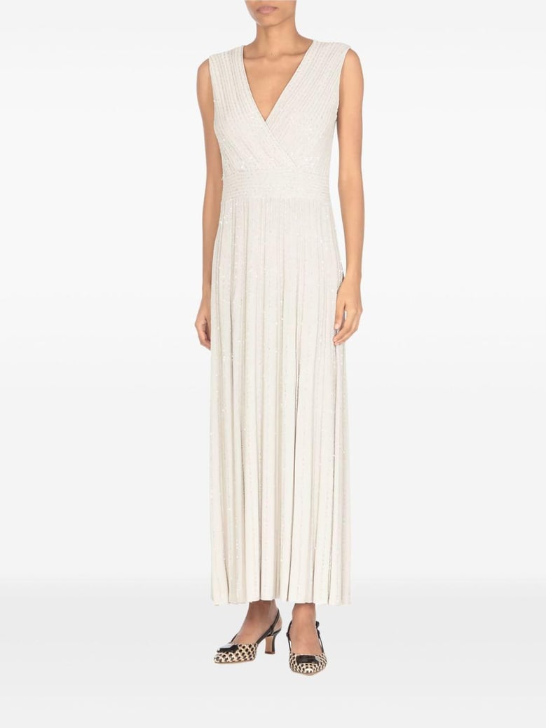 beige pleated maxi dress by Selfnex