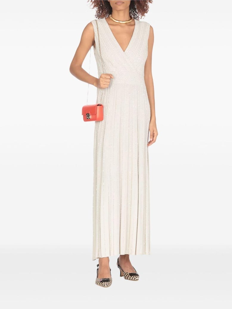 beige pleated maxi dress by Selfnex