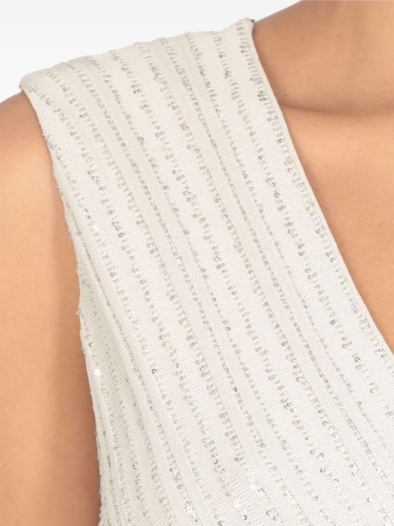 beige pleated maxi dress by Selfnex