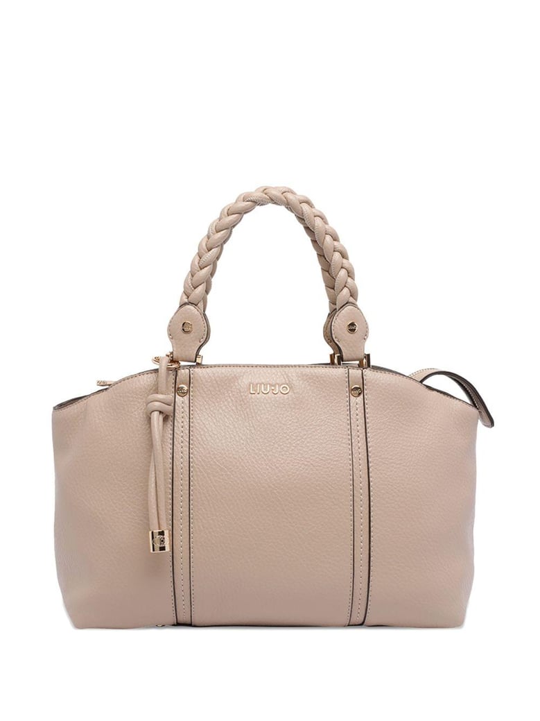 beige braided handle bag by Selfnex