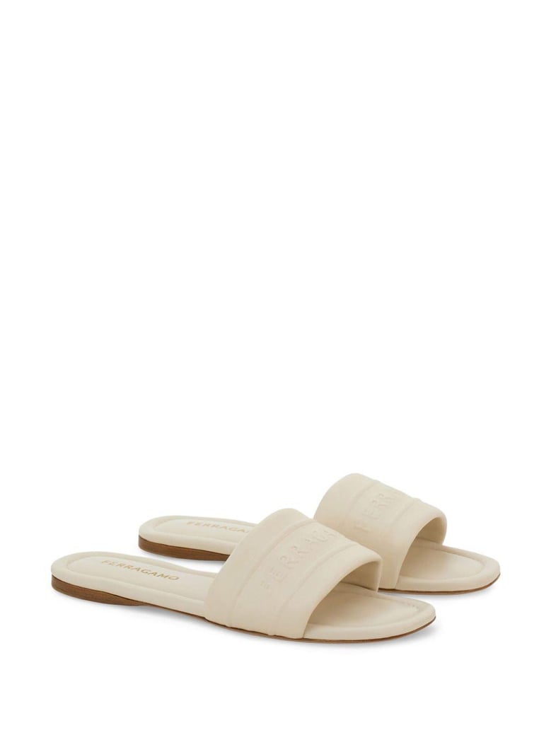 off-white lambskin slip-on sandals by Selfnex