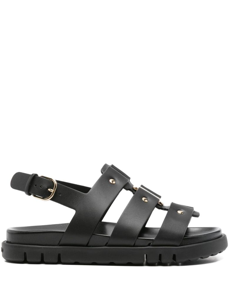 black buckle strappy heels by Selfnex