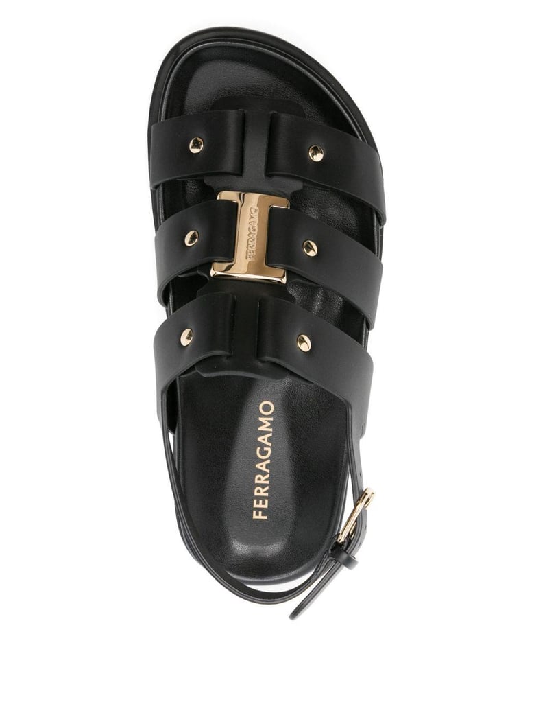 black buckle strappy heels by Selfnex