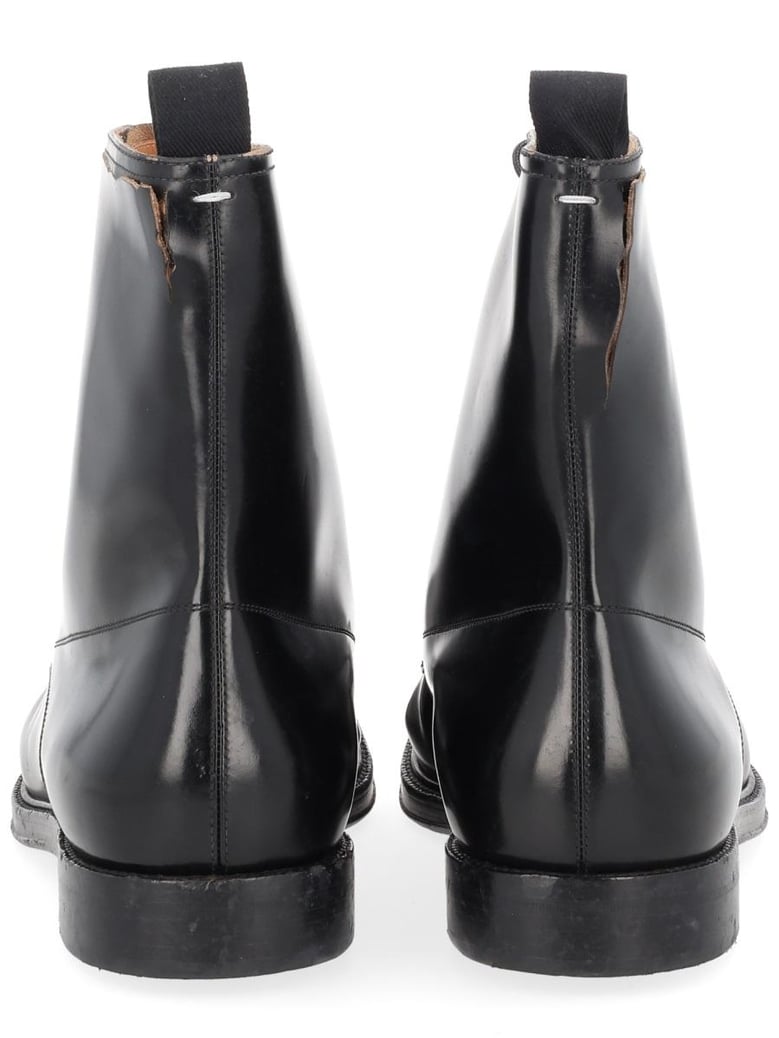 black leather loafers by Selfnex