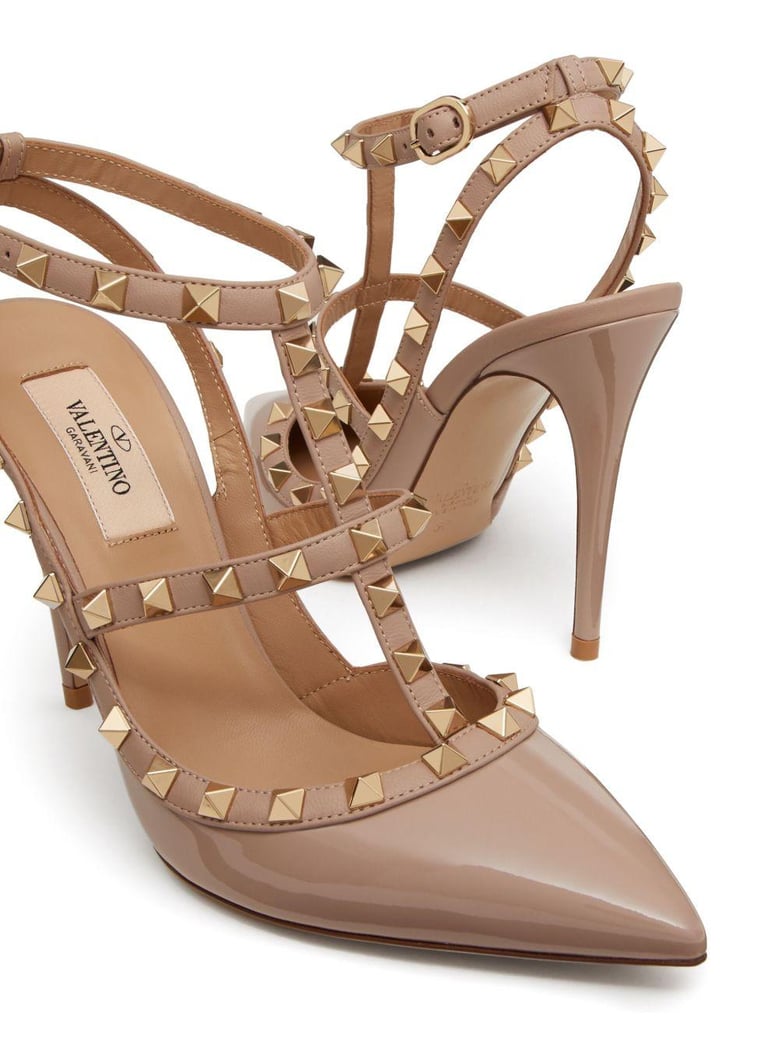 rockstud patent leather pumps by Selfnex