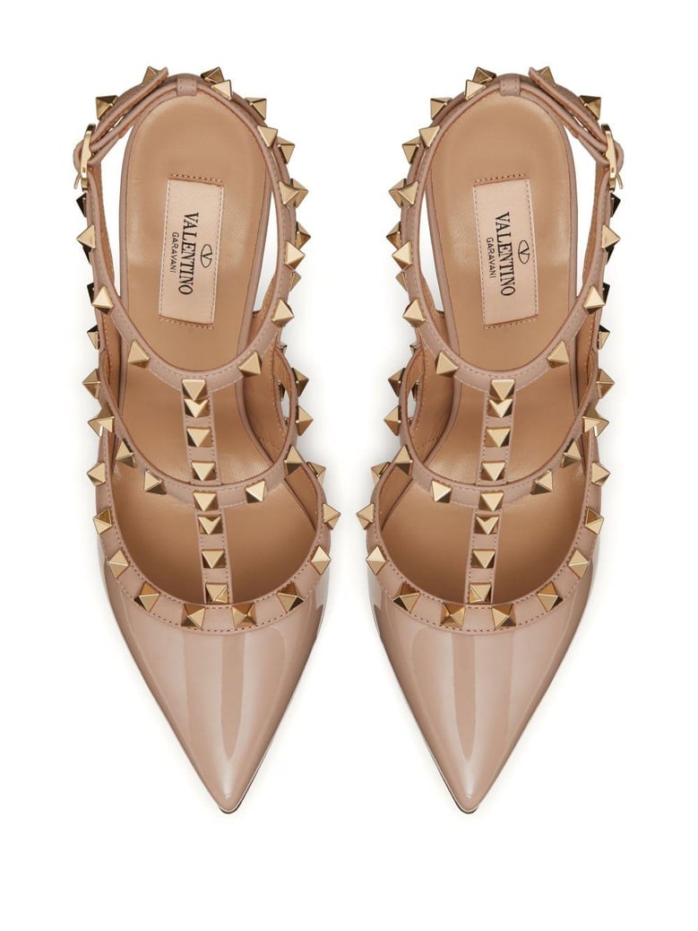 rockstud patent leather pumps by Selfnex