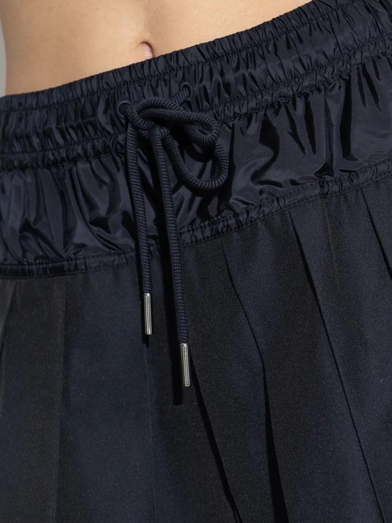 elastic waistband pleated skirt by Selfnex