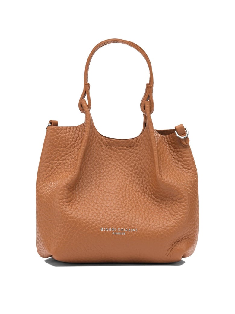 orange leather handbag by Selfnex