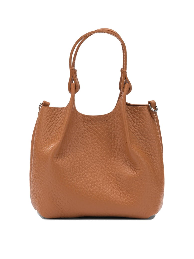 orange leather handbag by Selfnex