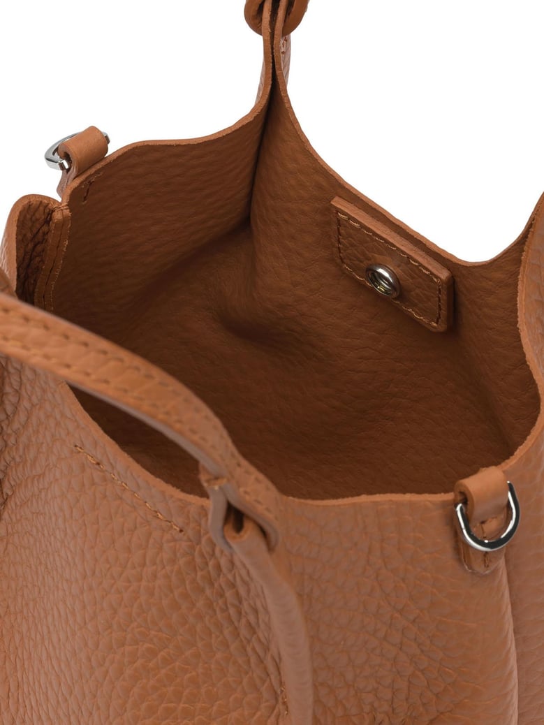 orange leather handbag by Selfnex