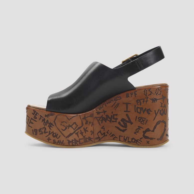 black leather maxime wedges by Selfnex
