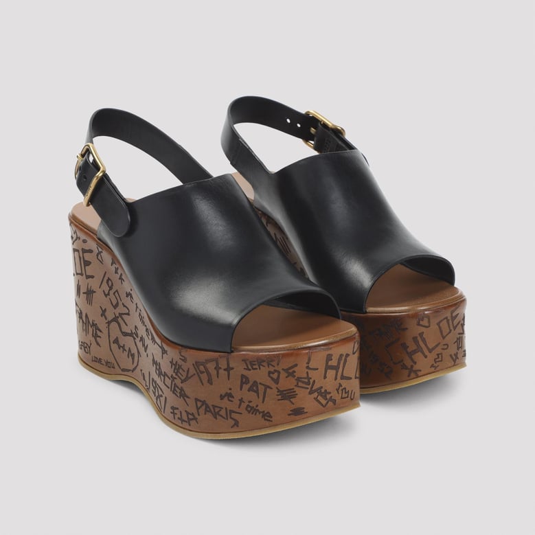 black leather maxime wedges by Selfnex