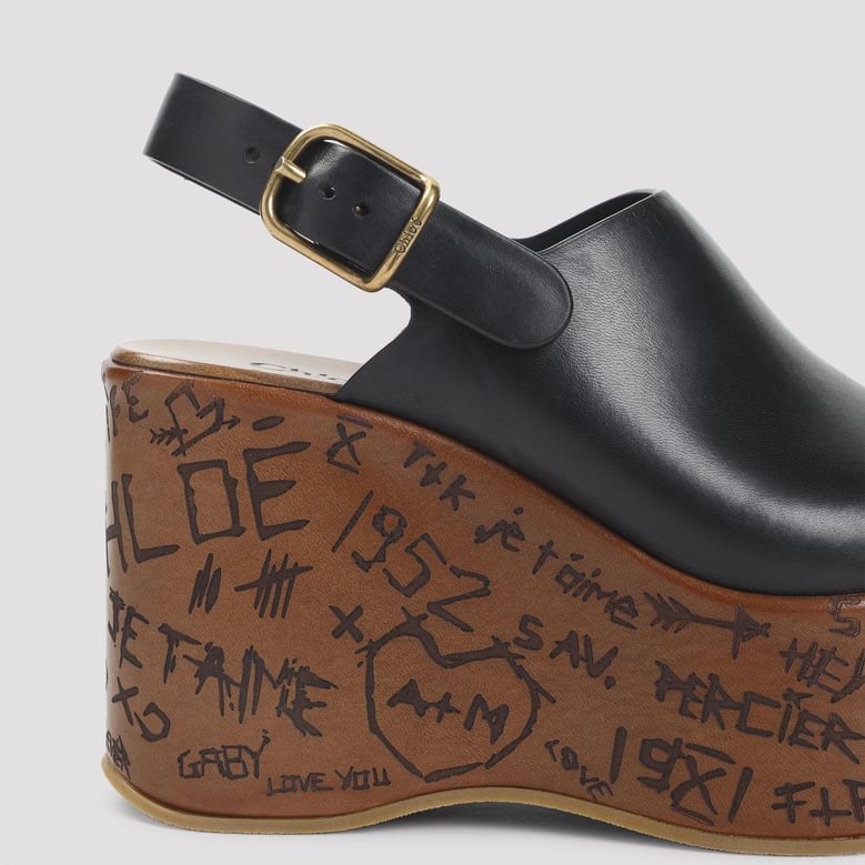 black leather maxime wedges by Selfnex