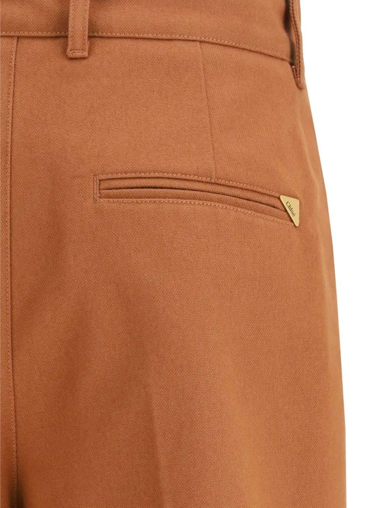 high waisted flared leg trousers by Selfnex