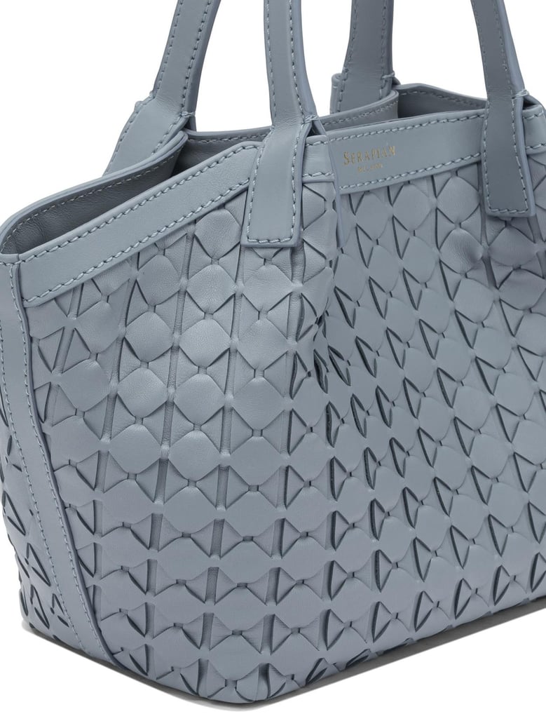 secret mini handbag by Selfnex