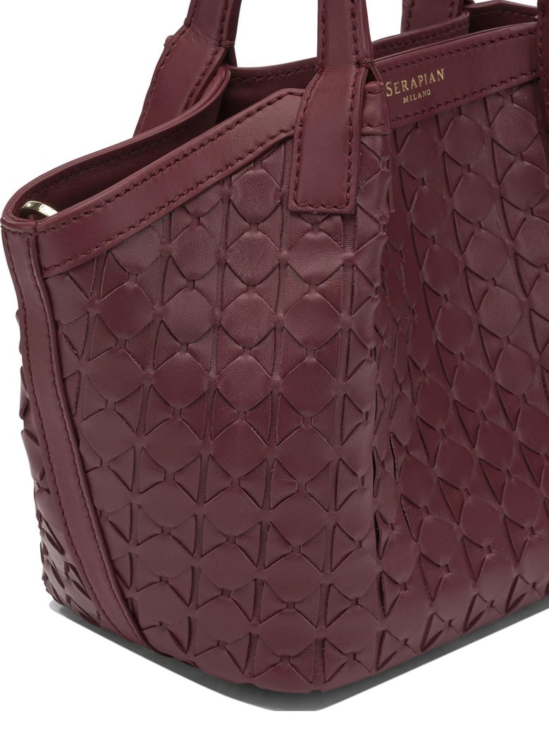 secret mini handbag by Selfnex