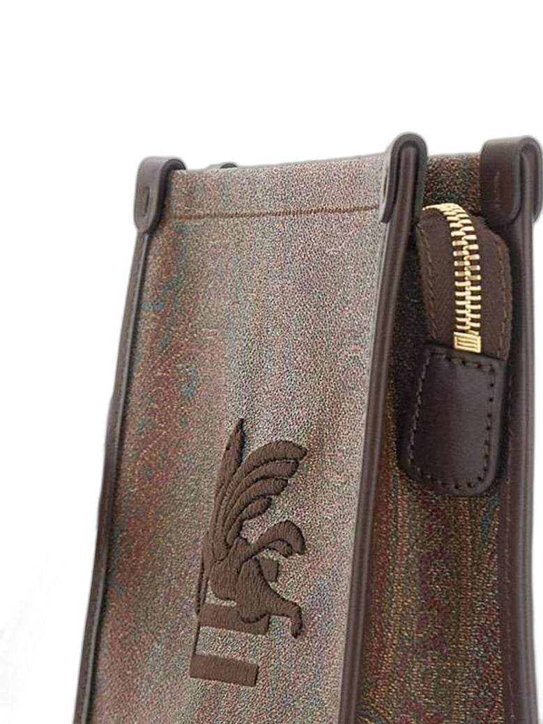 arnica pouch with wristlet and pegaso-embroidery by Selfnex