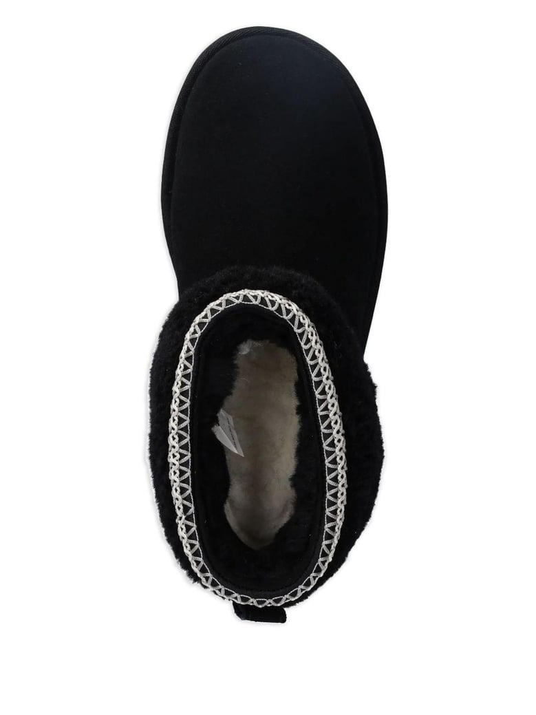 classic ultra mini maxi curly boots by Selfnex