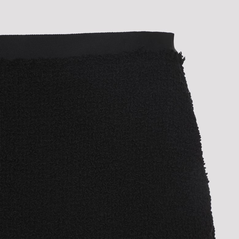 black asymmetric straight-fit virgin wool skirt by Selfnex