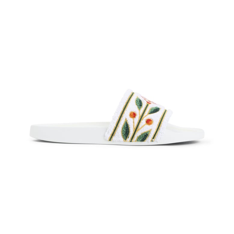 white embroidered terry sandals by Selfnex