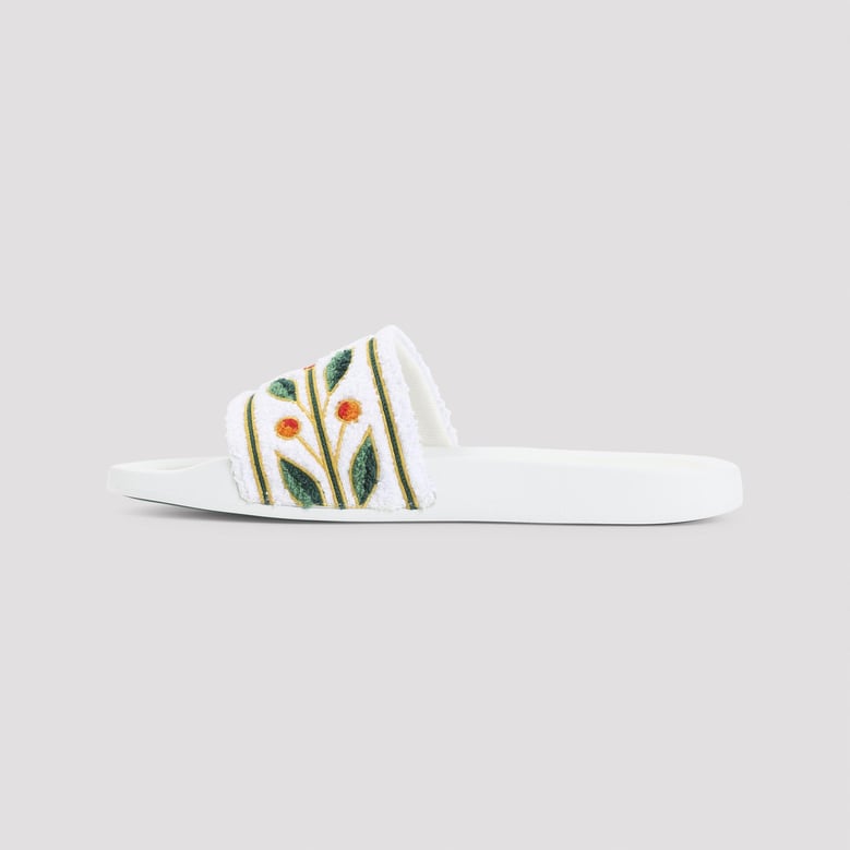 white embroidered terry sandals by Selfnex