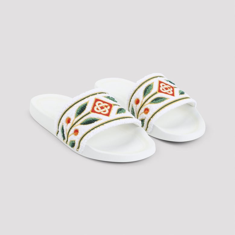 white embroidered terry sandals by Selfnex