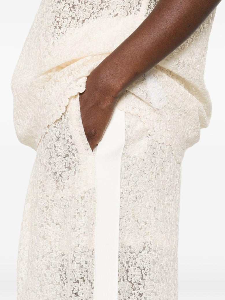 embroidered wide-leg trousers by Selfnex