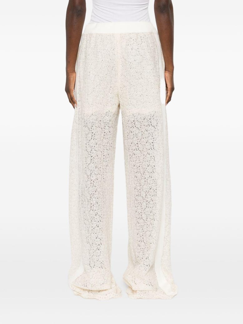 embroidered wide-leg trousers by Selfnex