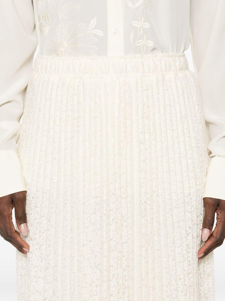 embroidered long skirt by Selfnex