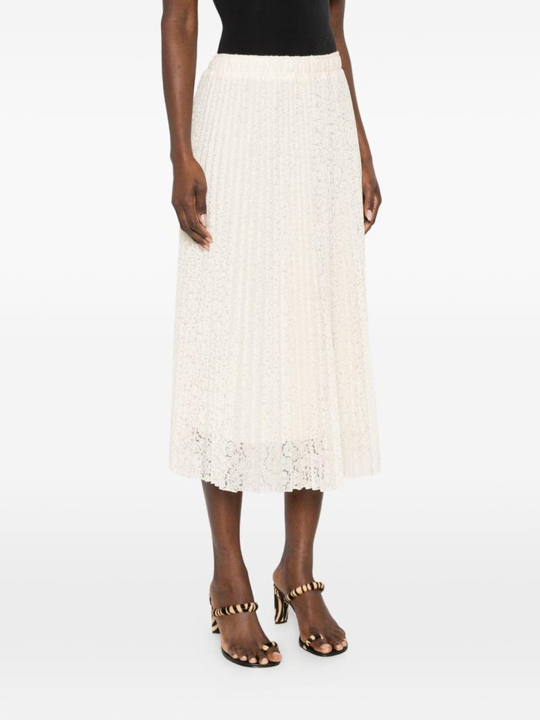 embroidered long skirt by Selfnex