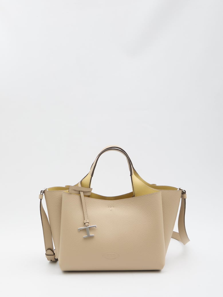 beige leather handbag by Selfnex