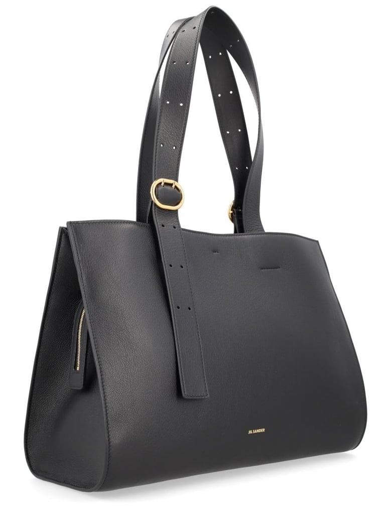 black leather handbag by Selfnex