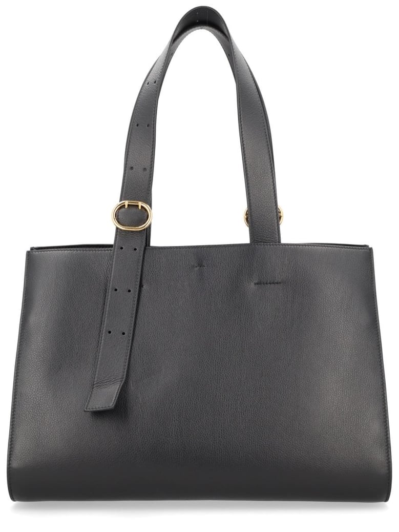 black leather handbag by Selfnex