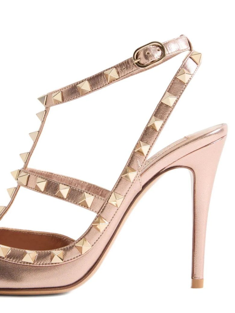 rockstud laminated nappa leather pumps 100 by Selfnex