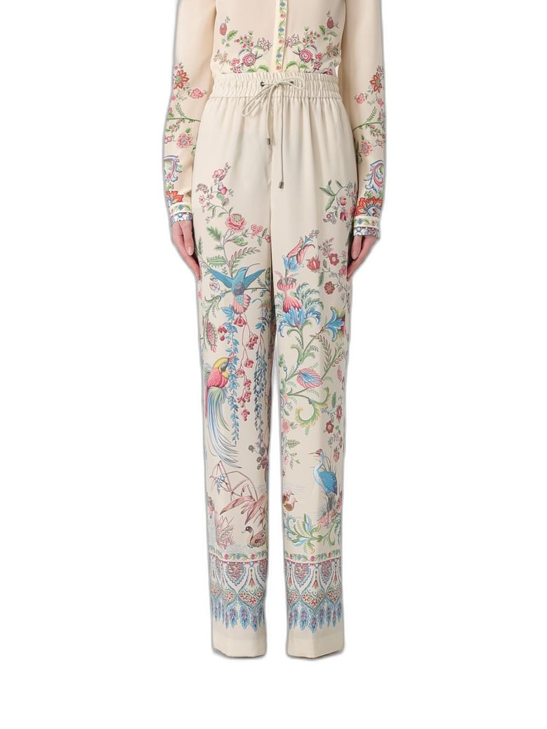white wideleg trousers with floral print by Selfnex