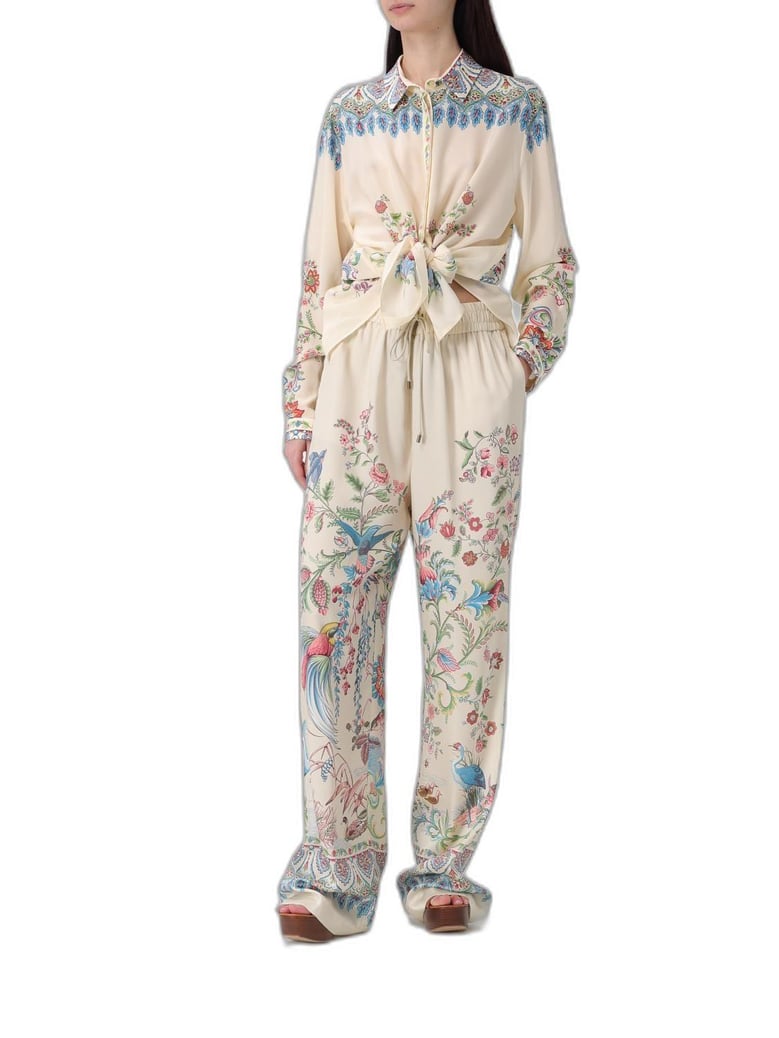 white wideleg trousers with floral print by Selfnex