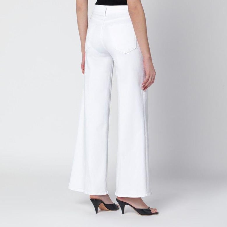 white flared fairest of them all jeans by Selfnex