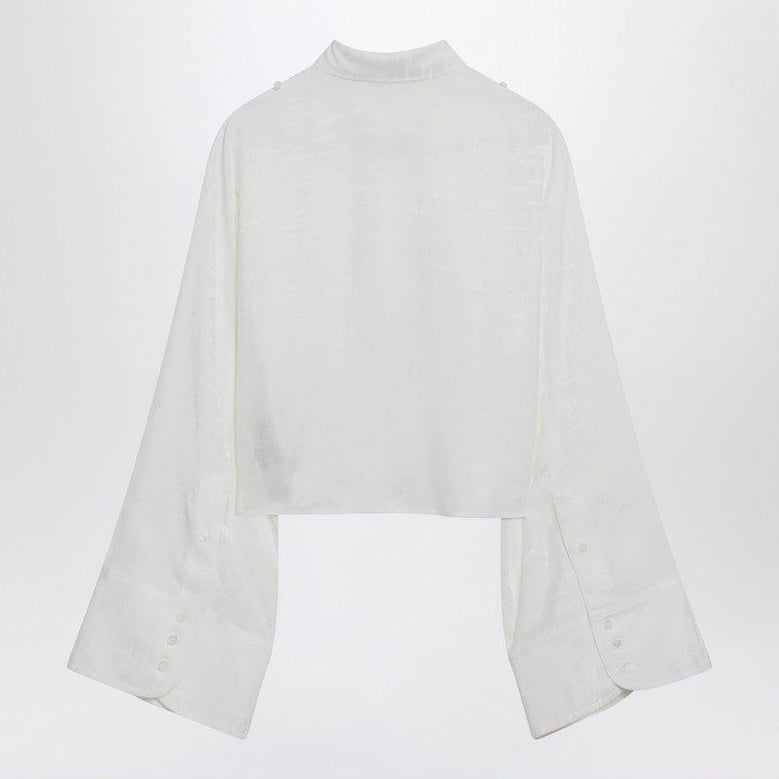 white shirt with allover logo graphic by Selfnex