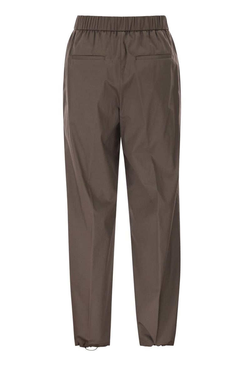 loose-fitting stretch cotton trousers with elasticated waistband by Selfnex