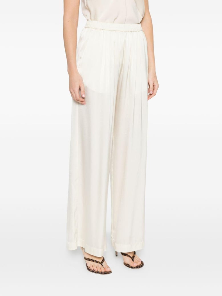 silk satin trousers by Selfnex